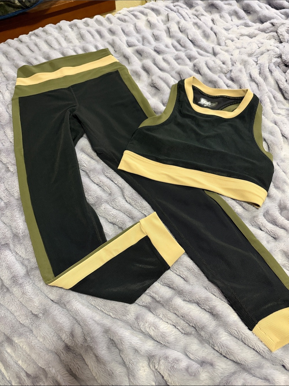 Women’s Athletic Leggings & Crop Top Set in Olive Green, Black and Tan.